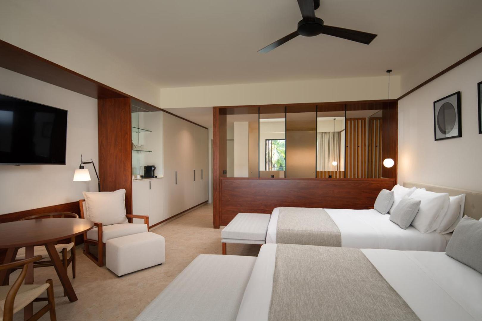 Suite Junior Deluxe con vistas a la piscina - 2 camas dobles